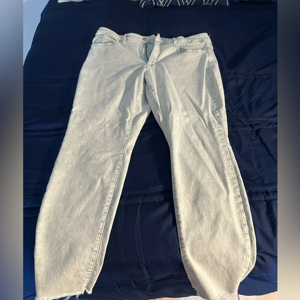 Light green jeans from Target. Universal Thread. Frayed at the bottom. Size 14.
